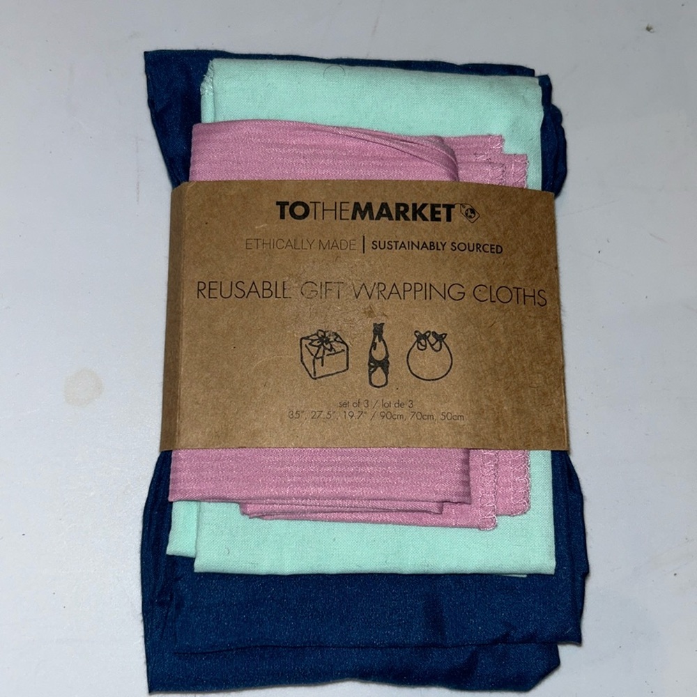 NWT  set of three reusable gift wrapping cloths. Ethically made